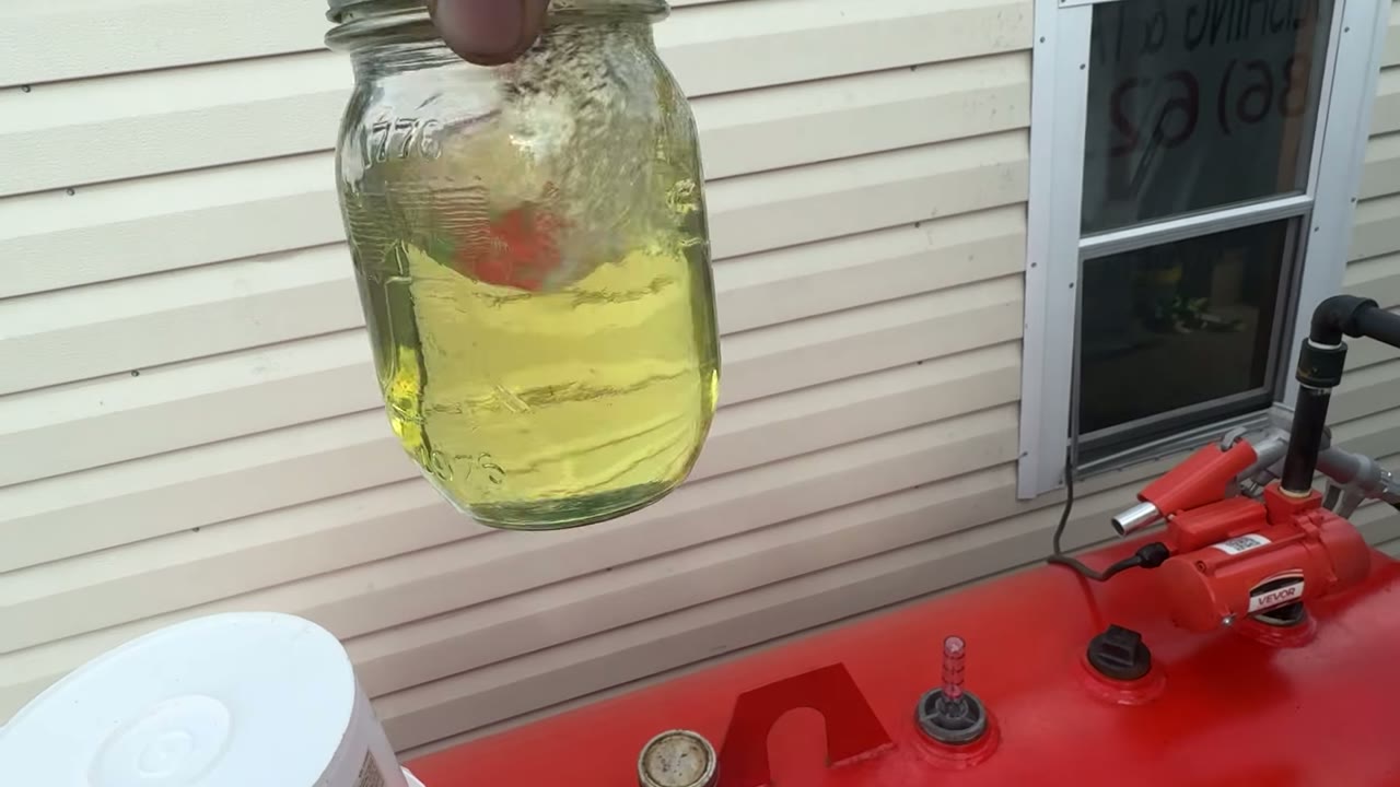 After polishing: a clearer yellow fuel sample from the same comparison